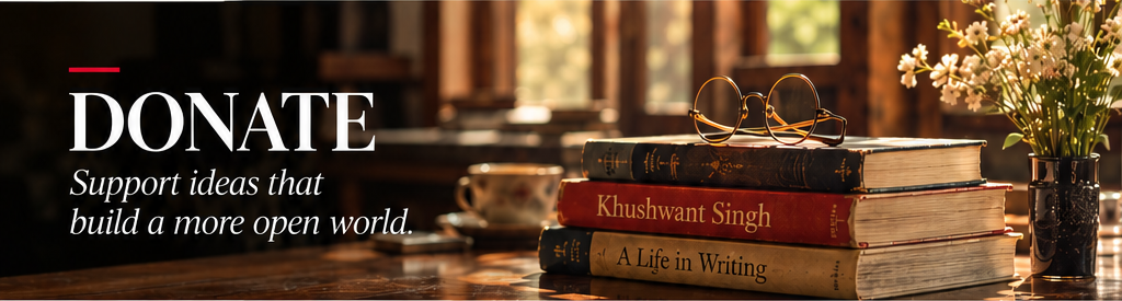 Books and glasses on a writing desk